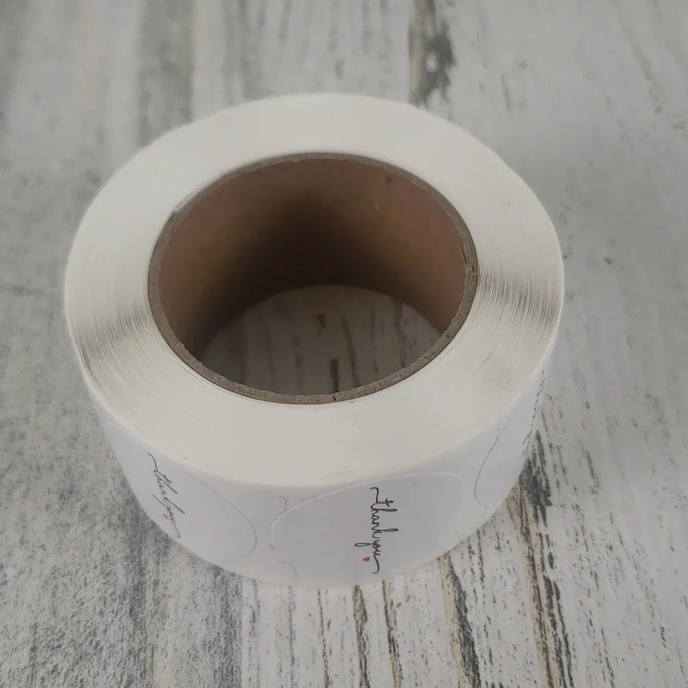 1 roll of 500 white Thank You stickers black cursive red heart